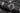 Black area rug 08 7'10 - styled in a bedroom