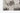 Ivory Polypropylene area rug 2'7" X 7 - styled in a dining room