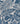 Blue area rug 5'3" X 7 - styled in a dining room