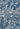 Blue area rug 5'3" X 7 - styled in a living room