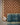 Brown area rug 1 5' X 8 - overhead flat lay view