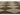 Brown area rug 4 8' X 10 - corner detail and border