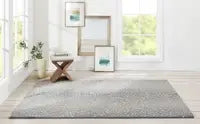 Woodland antelope blue wool rug styled for timeless home décor