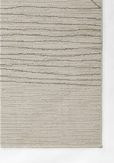 Ivory Polypropylene area rug 5'3" X 7 - close-up of pattern and texture