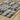 Oriental Weavers Atlas 752C0 Black and Gray Geometric Area Rug 10' x 13'2" - angled view showing pattern scale