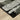 Oriental Weavers Atlas 752C0 Black and Gray Oversized Dining Room Rug Polypropylene Blend Area Rug 8'6" x 11'7" — corner detail and edge binding
