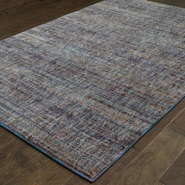 Oriental Weavers Atlas 8033F Purple and Gray Medium Living Room Rug Polypropylene Blend Area Rug 5'3" x 7'3" — angled view showing pattern scale