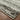 Oriental Weavers Atlas 8037G Ash and Charcoal Hallway Runner Polypropylene Blend Runner Rug 2'3" x 8' — corner detail and edge binding