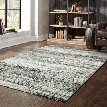 Oriental Weavers Atlas 8037G Ash and Charcoal Medium Living Room Rug Transitional Area Rug 5'3" x 7'3" — styled in a furnished room
