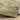 Oriental Weavers Atlas 8037J Gold and Green Hallway Runner Polypropylene Blend Runner Rug 2'3" x 8' — draped to show softness and drape