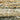 Oriental Weavers Atlas 8037J Gold and Green Hallway Runner Polypropylene Blend Runner Rug 2'3" x 8' — close-up of the woven pattern