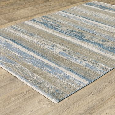 Oriental Weavers Bauer 042L2 Blue and Beige Compact Bedroom Accent Modern Area Rug 3'10" x 5'5" — angled view showing pattern scale