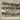 Oriental Weavers Bauer 8120D Beige and Charcoal Hallway Runner Abstract Runner Rug 2'3" x 7'6" — folded corner showing the backing