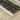 Oriental Weavers Bauer 090N2 Beige and Charcoal Medium Living Room Rug Polyester Area Rug 5'3" x 7'6" — corner detail and edge binding