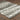Oriental Weavers Bowen Grey 042H2 Gray and Ivory Extra Large Room Anchor Polypropylene Area Rug 9'10" x 12'10" — angled view showing pattern scale