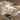 Oriental Weavers Bowen Grey 4928X Gray and Gold Large Seating Area Rug Polypropylene Area Rug 6'7" x 9'6" — angled view showing pattern scale