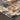 Oriental Weavers Bowen Grey 4928X Gray and Gold Large Seating Area Rug Polypropylene Area Rug 6'7" x 9'6" — corner detail and edge binding