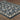 Oriental Weavers Bowen 534L2 Navy and Gold Oversized Dining Room Rug Polypropylene Area Rug 7'10" x 10'10" — angled view showing pattern scale