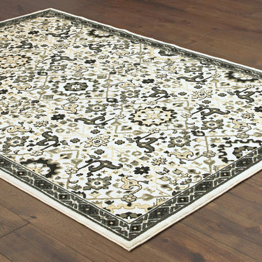 Oriental Weavers Bowen 073J2 Ivory and Navy Large Seating Area Rug Traditional Area Rug 6'7" x 9'6" — angled view showing pattern scale