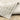 Oriental Weavers Branigan BRG02 Ivory and Gray Large Seating Area Rug Polyester Area Rug 6'7" x 9'6" — draped to show softness and drape