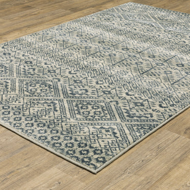 Oriental Weavers Branson BR02A Blue and Beige Compact Bedroom Accent Polypropylene Area Rug 3'3" x 5' — angled view showing pattern scale