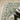 Oriental Weavers Branson BR04B Ivory and Blue Large Seating Area Rug Polypropylene Area Rug 7'10" x 10' — corner turned to show the edge