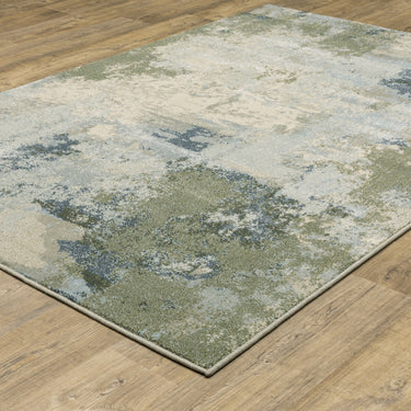 Oriental Weavers Branson BR08A Blue and Green Large Seating Area Rug Modern Area Rug 6'7" x 9'2" — angled view showing pattern scale