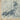 Oriental Weavers Branson BR08A Blue and Green Extra Large Room Anchor Abstract Area Rug 9'10" x 12'10" — folded corner showing the backing