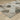 Oriental Weavers Cambria Grey 004L2 Gray and Brown Hallway Runner Geometric Runner Rug 1'10" x 7'6" — angled view showing pattern scale