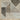 Oriental Weavers Cambria Grey 004L2 Gray and Brown Hallway Runner Geometric Runner Rug 1'10" x 7'6" — folded corner showing the backing