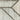 Oriental Weavers Cambria Grey 5569B Gray and Beige Hallway Runner Modern Runner Rug 1'10" x 7'6" — close-up of the woven pattern