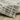 Oriental Weavers Cambria Natural 055X2 Tan and Charcoal Hallway Runner Modern Runner Rug 1'10" x 7'6" — draped to show softness and drape