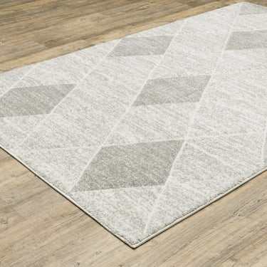 Oriental Weavers Cambria Grey 005W2 Gray and Ivory Extra Large Room Anchor Polypropylene Area Rug 9'10" x 12'10" — angled view showing pattern scale
