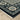 Oriental Weavers Capella CAP03 Deep Blue and Ivory Medium Living Room Rug Medallion Area Rug 5'3" x 7'6" — corner detail and edge binding
