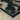 Oriental Weavers Capella CAP05 Navy Blue and Multi Hallway Runner Medallion Runner Rug 2'3" x 7'6" — corner detail and edge binding
