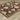 Oriental Weavers Capella CAP08 Rust Red and Beige Medium Living Room Rug Polyester Area Rug 5'3" x 7'6" — angled view showing pattern scale