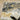 Oriental Weavers Caravan Grey 2061X Gray and Gold Large Seating Area Rug Modern Area Rug 6'7" x 9'6" — corner turned to show the edge