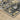 Oriental Weavers Caravan Grey 2061X Gray and Gold Hallway Runner Polyester Runner Rug 2'3" x 7'6" — corner detail and edge binding