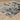 Oriental Weavers Caravan Grey 4153Q Gray and Black Compact Bedroom Accent Abstract Area Rug 3'3" x 5' — angled view showing pattern scale